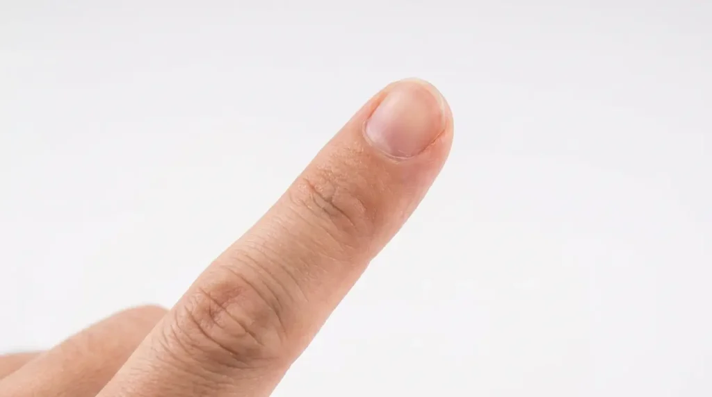 Index finger used as a nine inch measurement guide