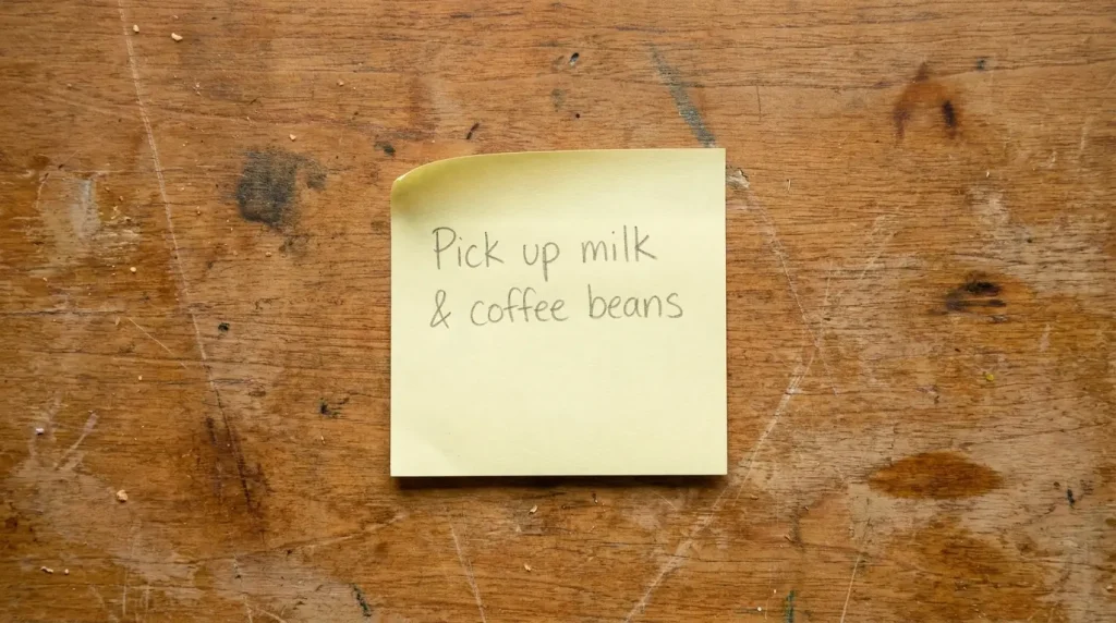 Standard sticky note used as a visual reference for how long 3 inches actually is